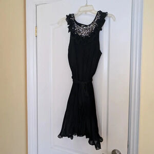 Elegant Black Sleeveless Dress with Beaded Neckline